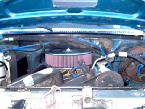 1984 Ford Bronco - Front-support bracket is bolted to accessory/AC bracket at front of engine