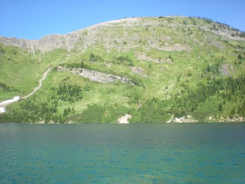 1974 Ford Ranchero - Scenic view of a mountain lake and hillside, with a watermark at the bottom right.