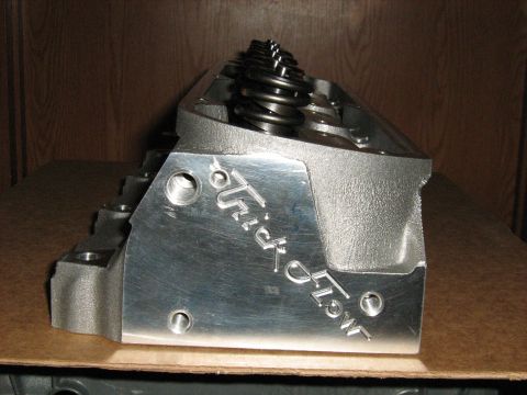1988 Mercury Grand Marquis - An aluminum engine cylinder head with visible valve springs and the 'Trick Flow' logo is shown.