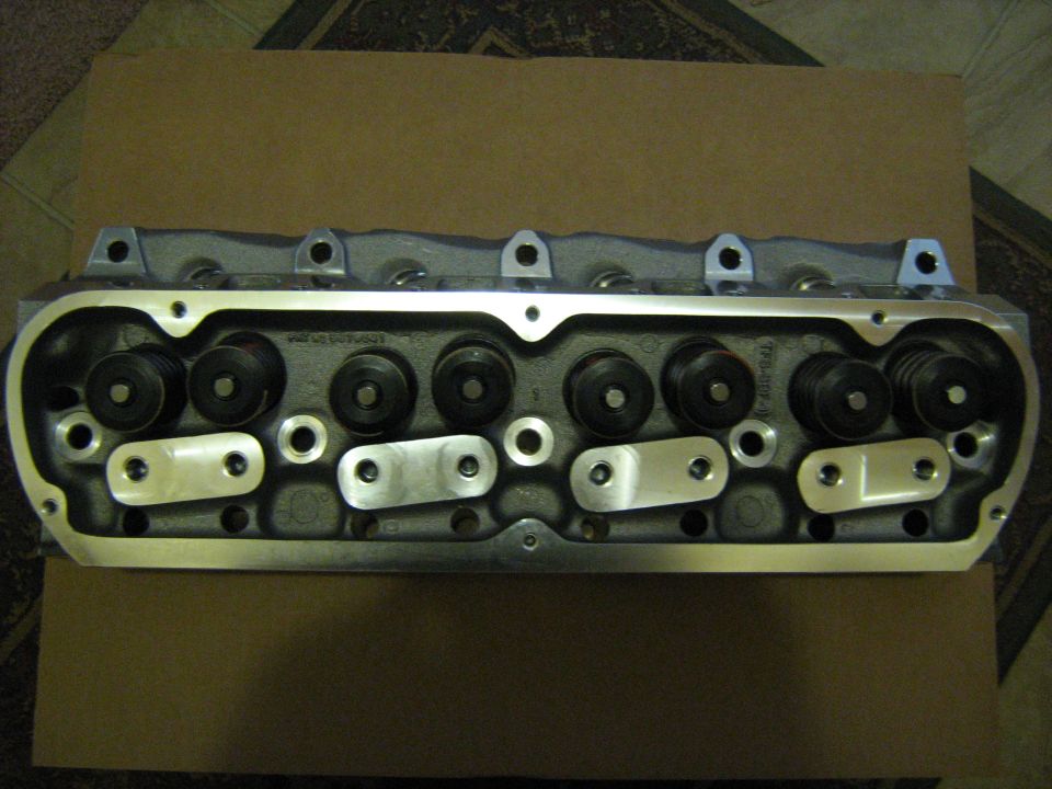 Engine cylinder head with valves and rocker arms visible