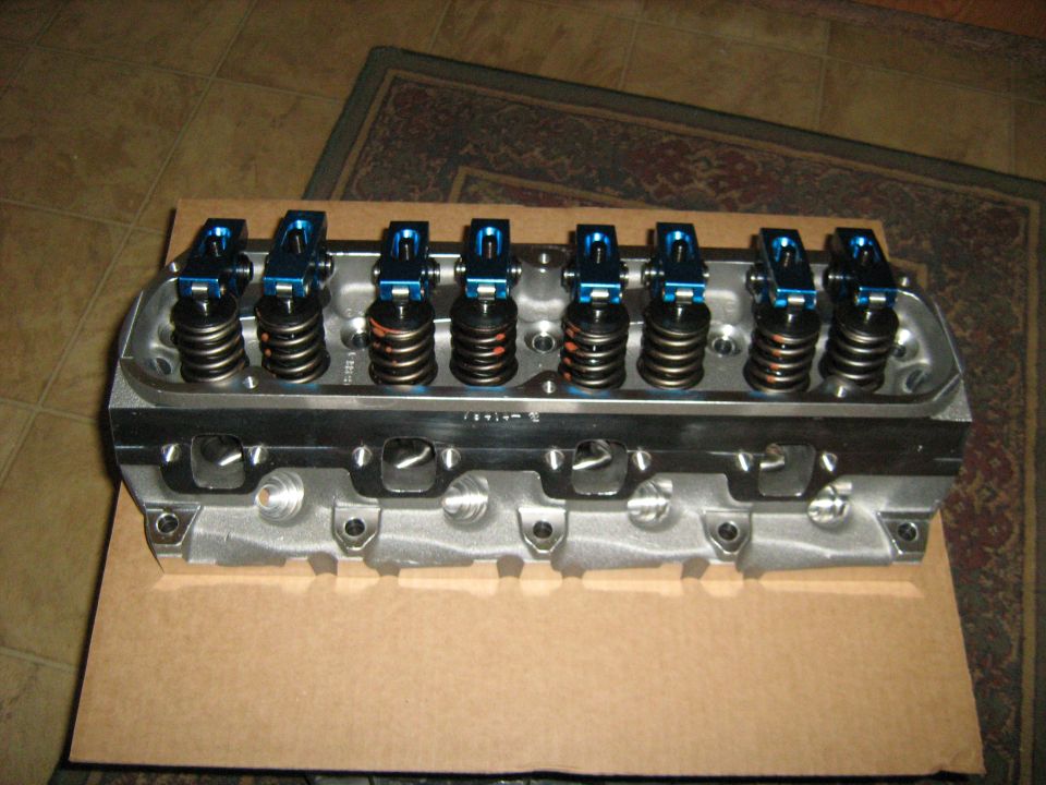 Aluminum engine cylinder head with blue roller rockers and springs