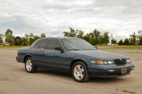 1985 Mercury Grand Marquis - This sedan's body style suggests a mid-1990s model, not a 1985 Mercury Grand Marquis.