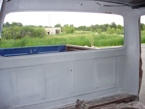 1979 Ford F-250 - View from inside a 1979 Ford F-250 truck bed, showing the interior and the landscape beyond.