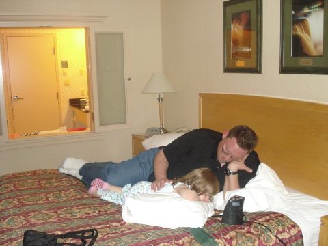 My Mia - Her second year - Mia and Daddy watching a movie before bedtime at our hotel.