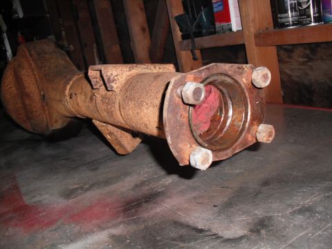 1991 Ford Bronco - Close-up of a rusty axle housing, likely from a Ford Bronco.