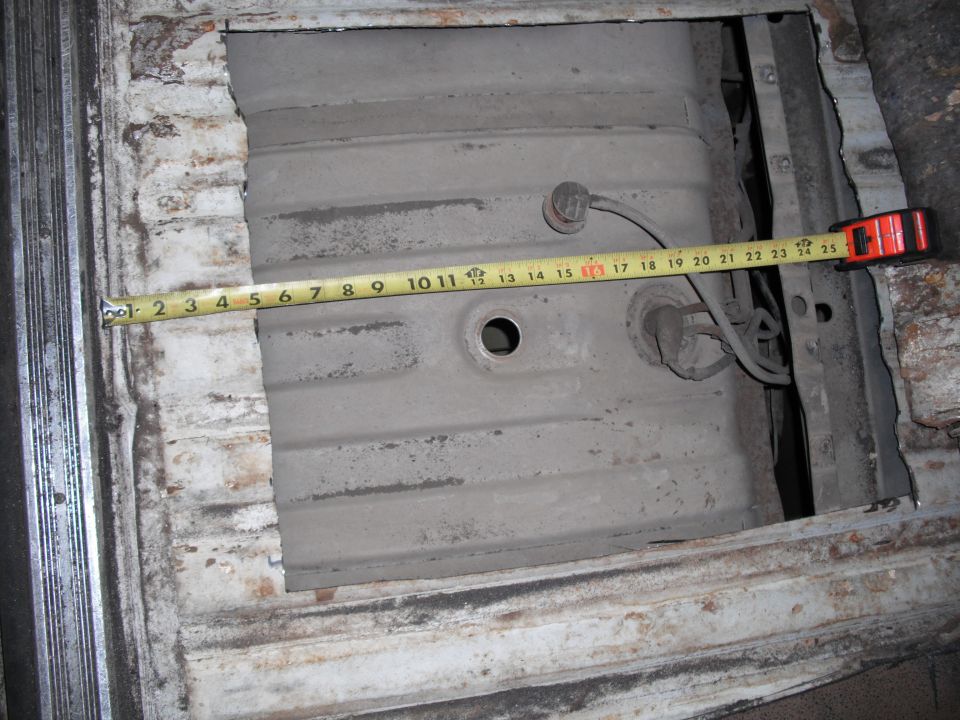 fuel tank with tape measure across it