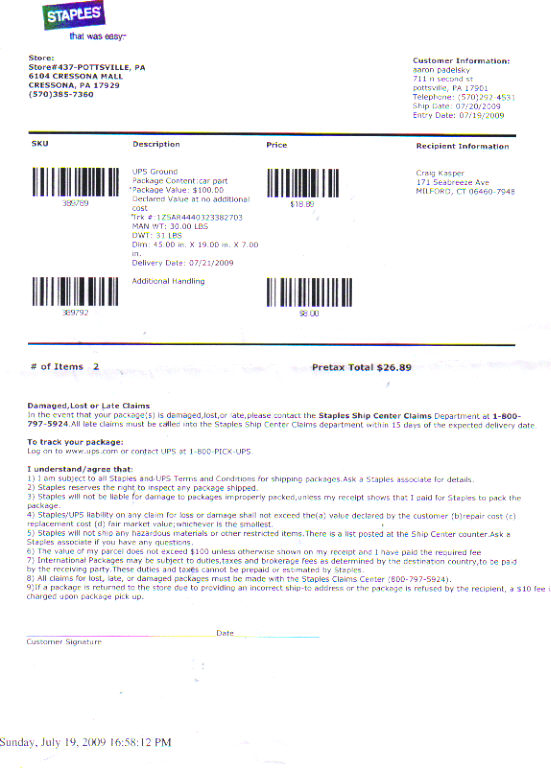 Staples receipt with shipping details and terms