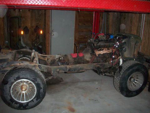 1978 Jeep CJ5 - This 1978 Jeep CJ5 chassis is undergoing work, showing the engine and frame.