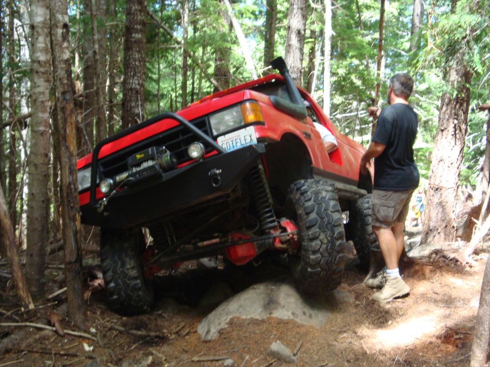 John trying his luck with the truck eating tree