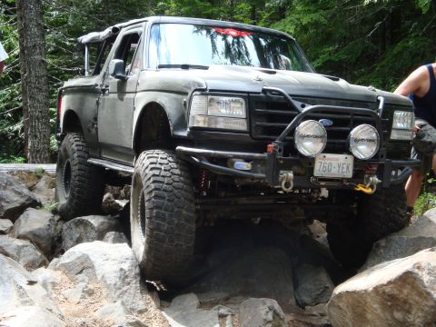 1978 Ford Bronco - This modified Ford Bronco navigates a rocky trail, its off-road capabilities.