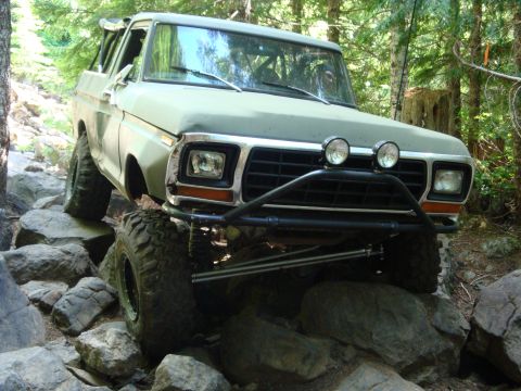 1978 Ford Bronco - This 1978 Ford Bronco navigates a rocky trail with its front end angled towards the camera.