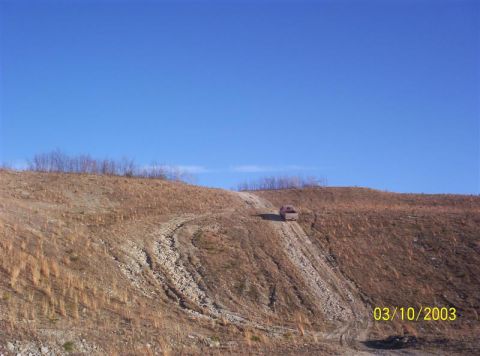 1992 Ford F-150 - Picture 2 of 4 of me climbing a hill on an old strip mine near where I live. This hill is kind of steep but it really isn't all that bad co…