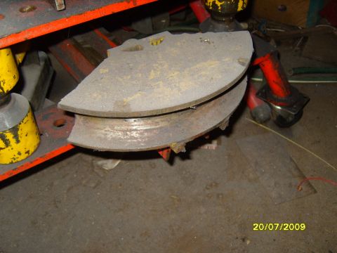1989 Ford Bronco - Close-up of a pipe bender die, likely part of a tool or machinery.