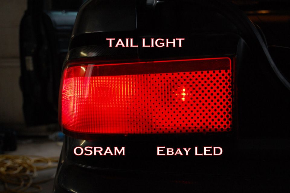 Red tail light lit up comparing OSRAM bulb vs eBay LED brightness