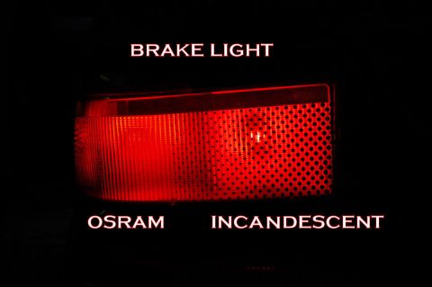 1985 Mercury Grand Marquis - Close-up of a red brake light assembly, labeled 'OSRAM INCANDESCENT'.