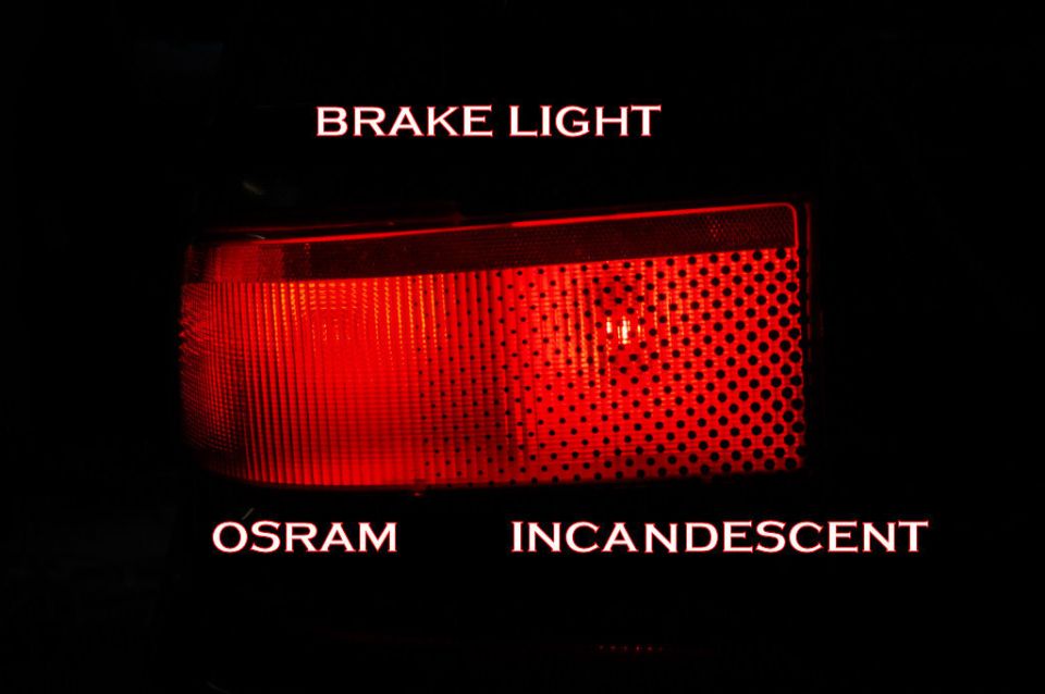 Red tail light lit at night labeled BRAKE LIGHT comparing Osram bulb to incandescent