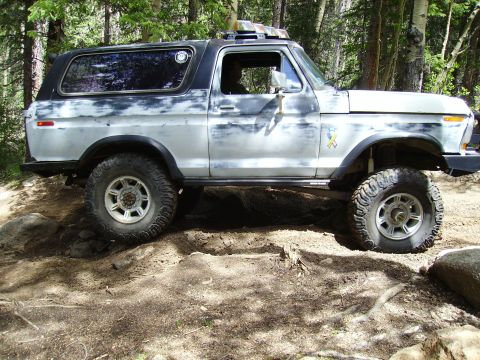 1978 Ford Bronco - This 1978 Ford Bronco is navigating a rocky, wooded trail.