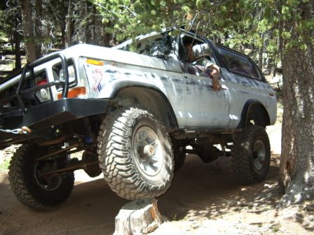 1978 Ford Bronco - This lifted 1978 Ford Bronco navigates rough terrain with its large off-road tires.