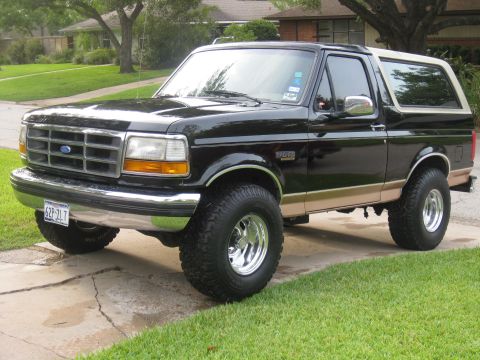 1994 Ford Bronco - This 1994 Ford Bronco has a two-tone paint scheme and large off-road tires.