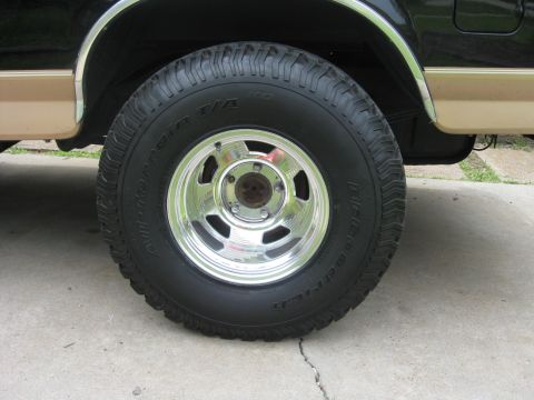 1994 Ford Bronco - This 1994 Ford Bronco features BFGoodrich All-Terrain T/A tires mounted on chrome wheels, visible from the side.