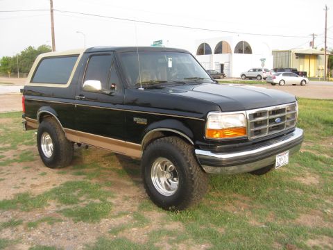 1994 Ford Bronco - This 1994 Ford Bronco features a two-tone paint scheme and aftermarket wheels.