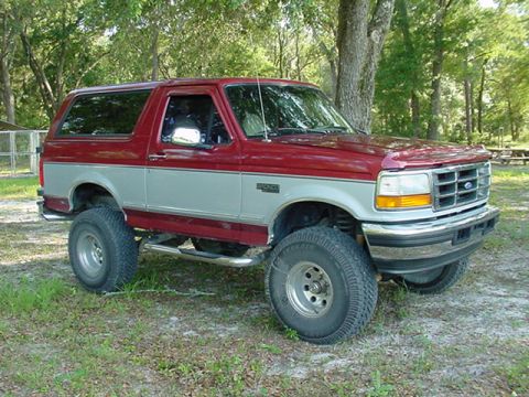 1996 Ford Bronco - This lifted 1996 Ford Bronco is shown from a three-quarter front angle.