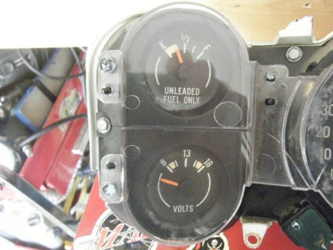 1991 Nissan Micra - Dashboard gauges include a fuel level indicator and a voltmeter. The fuel gauge is labeled 'UNLEADED FUEL ONLY'.