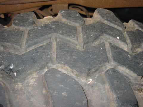 1989 Ford Bronco - Drivers rear tire tread.