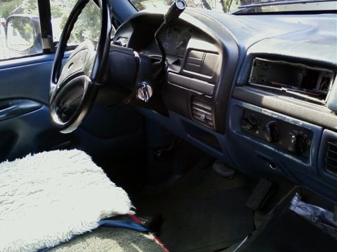 1994 Ford F-250 - Interior view of a 1992 Ford F-Series truck, showing the dashboard and steering wheel.