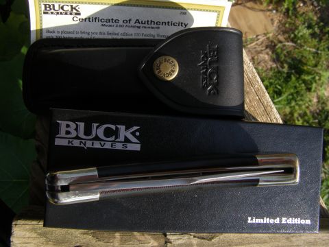 2000 Ford Crown Victoria - Buck 110 Folding Hunter knife, limited edition, with certificate of authenticity and leather sheath.