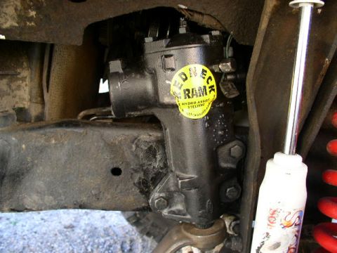 1979 Ford Bronco - Close-up of a steering component, likely from an off-road vehicle, with visible text on a sticker.