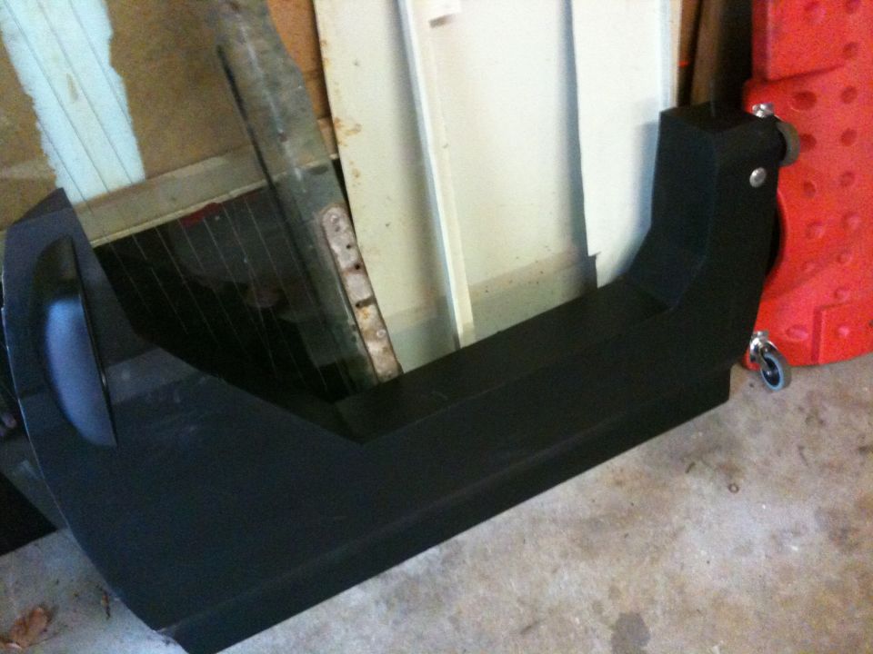 Black aftermarket rear bumper with tow hitch receiver