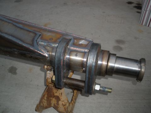 1995 Ford Bronco - Close-up of a custom-fabricated rear axle assembly, indicating significant metalwork and welding.