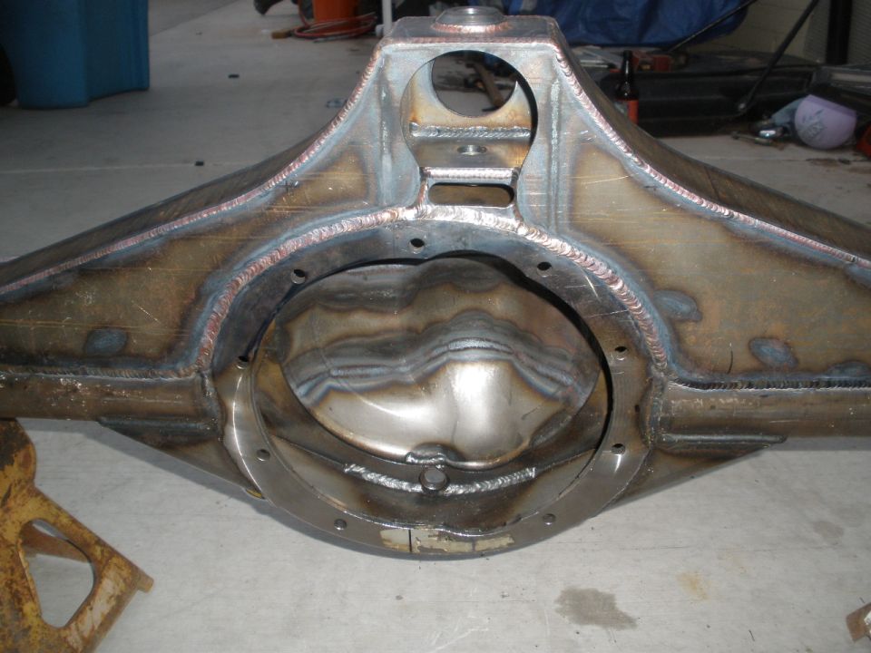 Custom fabricated rear axle housing with heavy welds and a large differential cover opening
