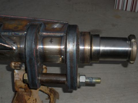 1995 Ford Bronco - Fabricated rear axle assembly shown on a jack stand, likely for a custom build or repair.