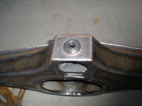1995 Ford Bronco - This fabricated rear axle housing shows extensive welding and a central threaded insert for mounting.