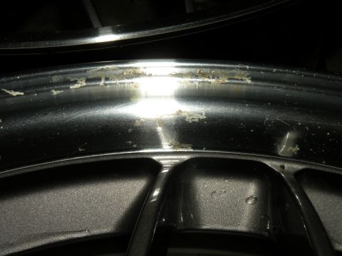 1998 Subaru Legacy - Corrosion damage is visible on the rim of this alloy wheel.