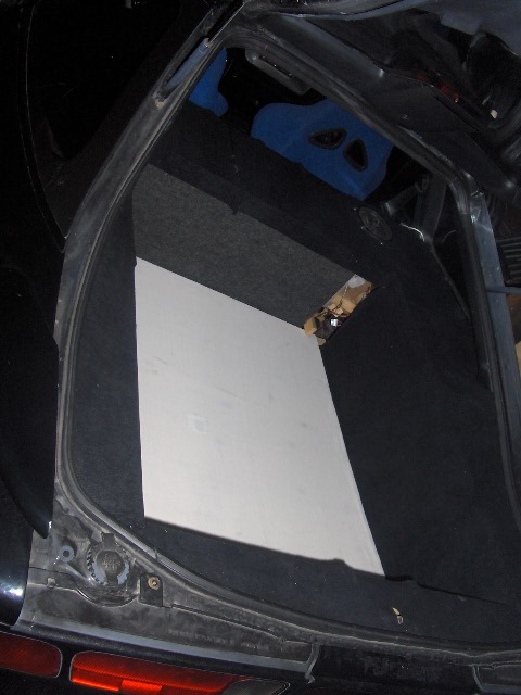 1993 Ford Probe - Trunk Shot prepping for glass, rear seat delete, carputer mounted, hideaway second battery in spare tire well