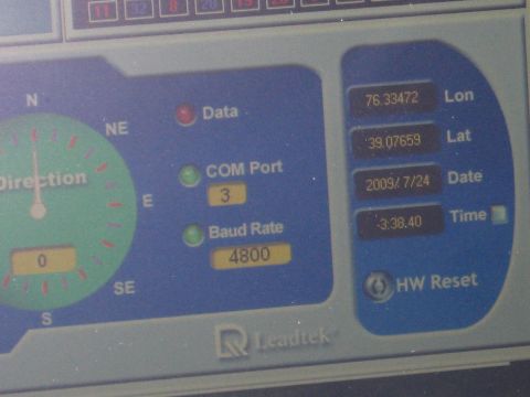2001 Ford Crown Victoria - GPS unit displays direction, coordinates, date, and time with Leadtek branding.