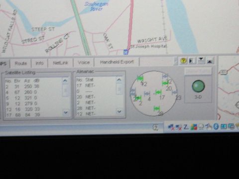 2001 Ford Crown Victoria - GPS satellite status display with a map showing streets and a river.