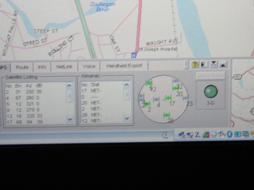 Computer screen showing GPS satellite status with a map in the background
