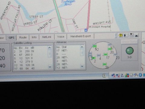 2001 Ford Crown Victoria - The GPS screen displays satellite signal strength and location data, with a map showing local streets and the Souhegan River.
