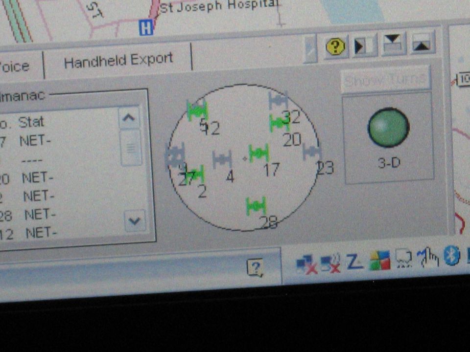 Computer screen showing a GPS map with satellite icons and a list of data points