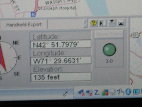 2001 Ford Crown Victoria - GPS display shows current location coordinates and elevation data.