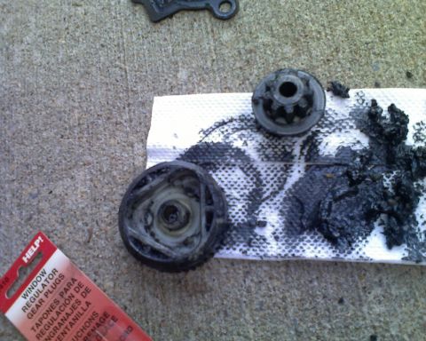 1987 Ford Bronco - Window regulator gear parts and grease are shown, along with a HELP! brand package for gear plugs.