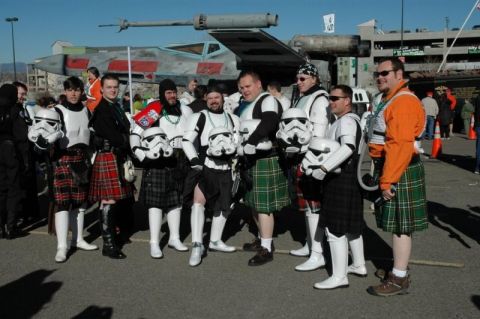 1990 Ford Bronco - A group of cosplayers, some in kilts, pose with a prop spaceship in the background.