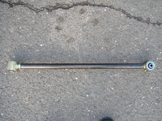 Radius arm crossmember and track bar mount on asphalt