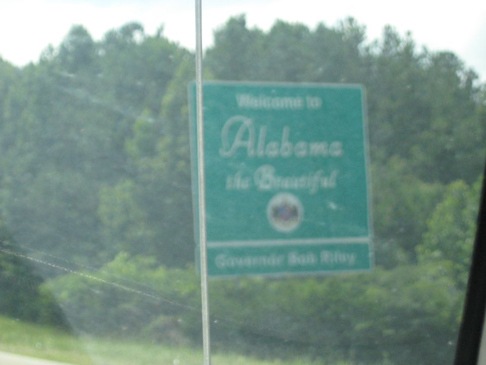 Sign saying Welcome to Alabama the Beautiful, with governor's name below