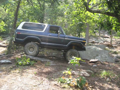 1978 Ford Bronco - This 1978 Ford Bronco tackles a challenging rocky terrain, its off-road capabilities.