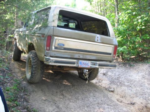 1978 Ford Bronco - This 1978 Ford Bronco is captured from the rear as it navigates an off-road trail.